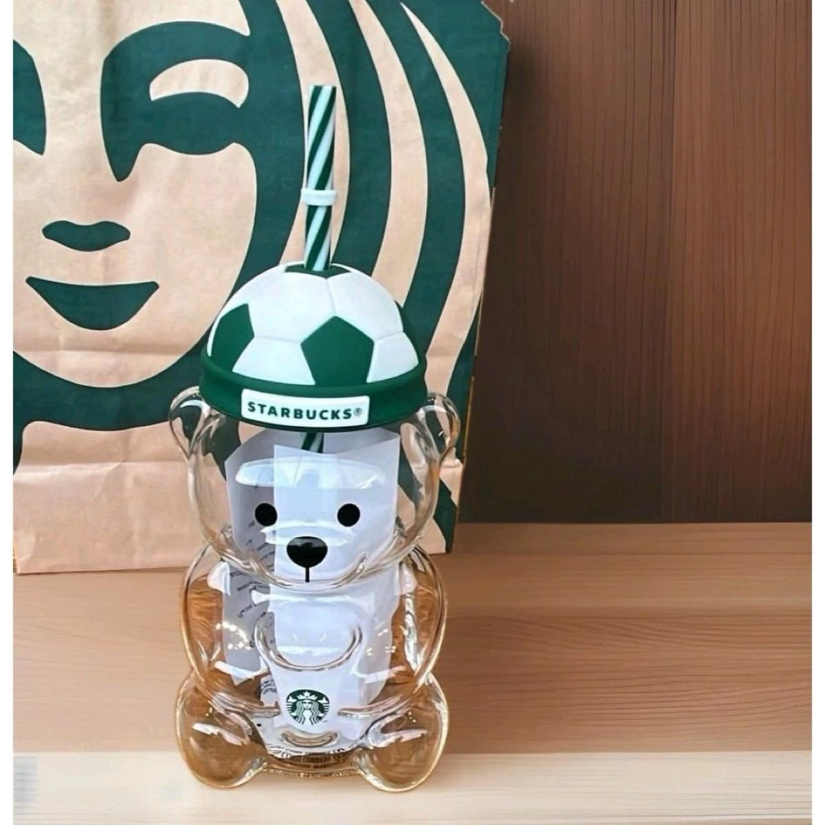 Starbucks Bearista bear glass cold cup with green soccer ball lid and striped straw